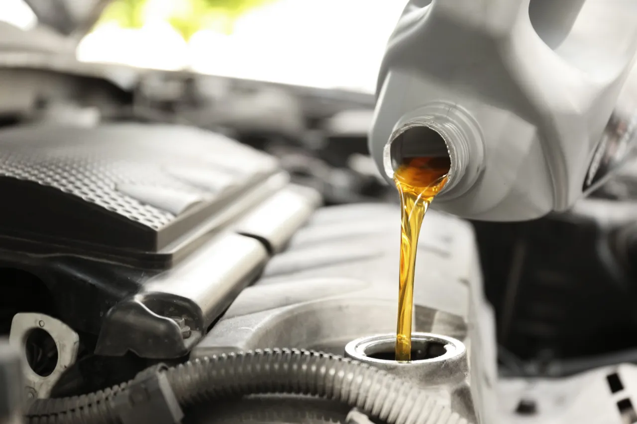 Oil change service on a vehicle in Warren, Rhode Island